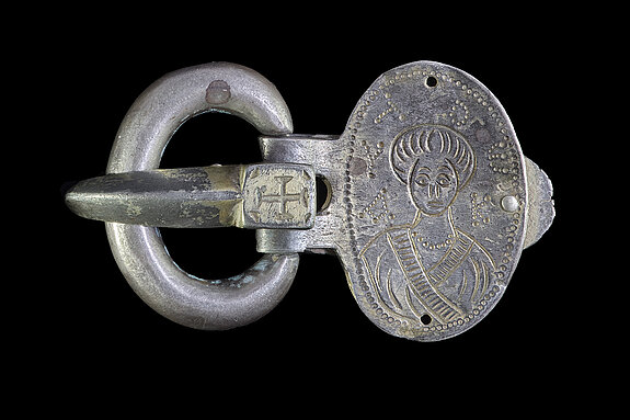 A belt buckle with St Luke - early Christian late antiquity (2nd half of the 5th/early 6th century) is one of the ‘2,972 things’ in the new section. (©Diözesanmuseum Freising, Photo: hires objects)